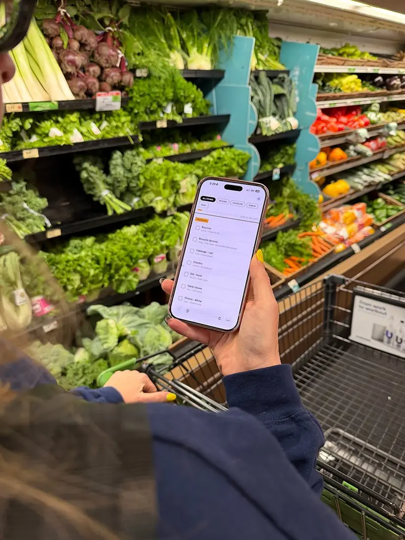 Jen using Let's Plan Dinner in Shop Mode in the grocery produce aisle